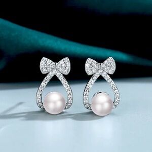 STERLING SILVER ,PEARL & ZIRCON BOW EARRINGS